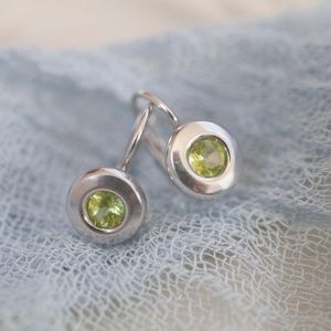 14k white gold earrings with peridot stones